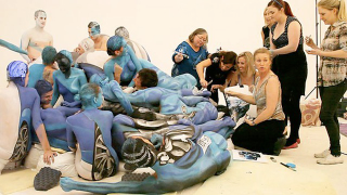 Illustration for article titled Who Wants to Drive a Crashed Car Made with Naked Bodypainted People?